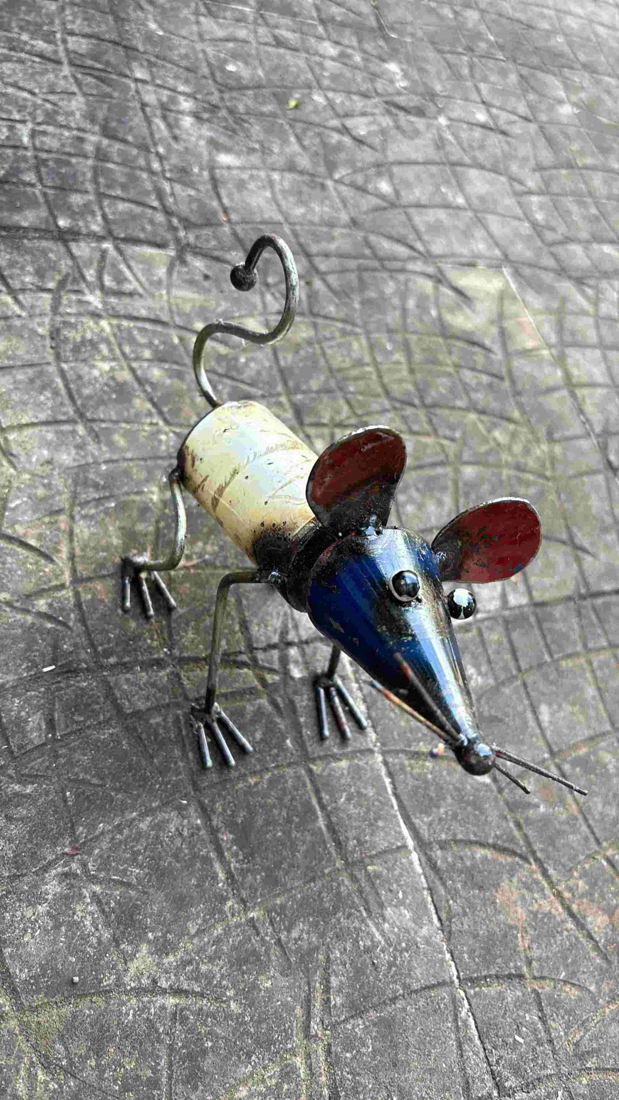 Mouse-shaped handmade artwork created from recycled oil drums by Henart.design
